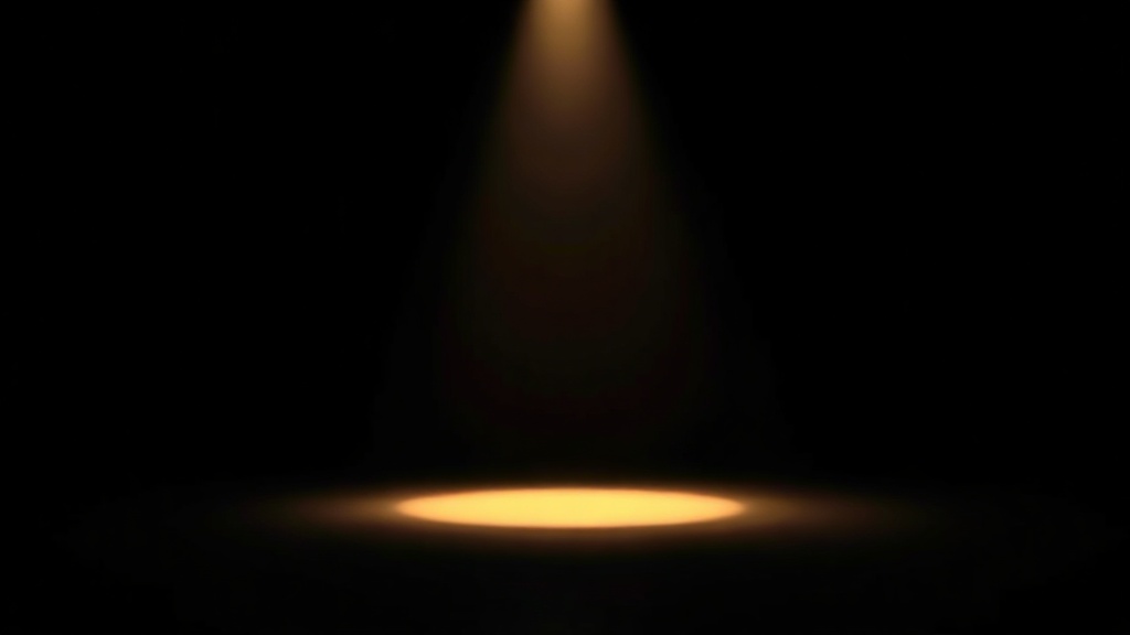 A single spotlight on a plain stage
